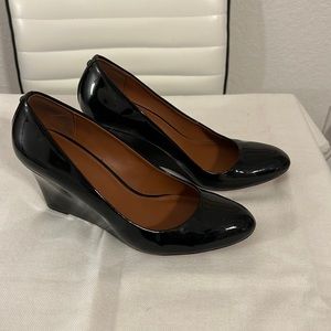 Coach wedge black patent leather shoes. Hardly worn. Excellent condition.